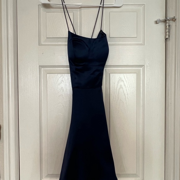Size 0 Blue dress with crisscross tie back. Zipper on the skirt - Picture 2 of 5